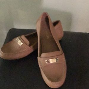 Two pairs of leather Coach loafers